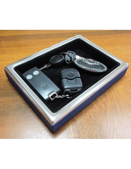 Taschenentleerer aus 925er Sterlingsilber und Blauem Leder