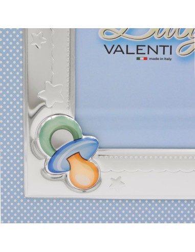 Blaues Babyfotoalbum mit Schuhen und Schnuller
